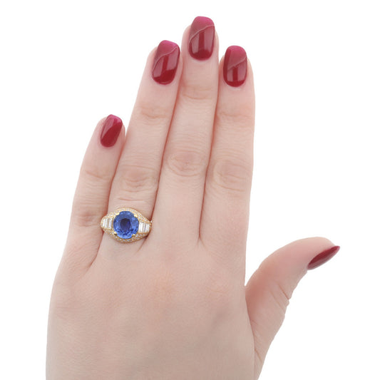 Bulgari 1980s 18KT Yellow Gold Sapphire & Diamond Trombino Ring on finger