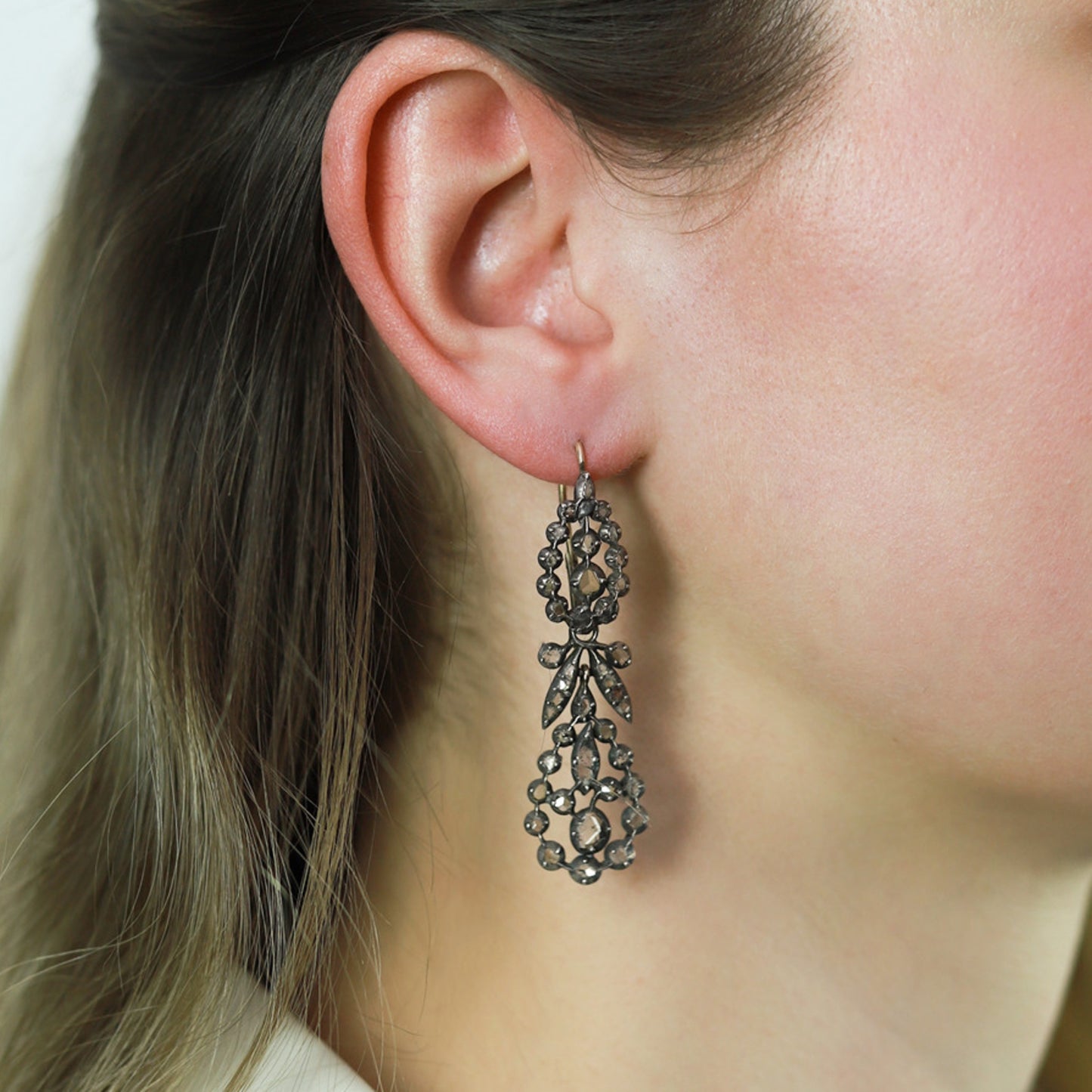 English Victorian Silver & 18KT Yellow Gold Diamond Earrings on ear