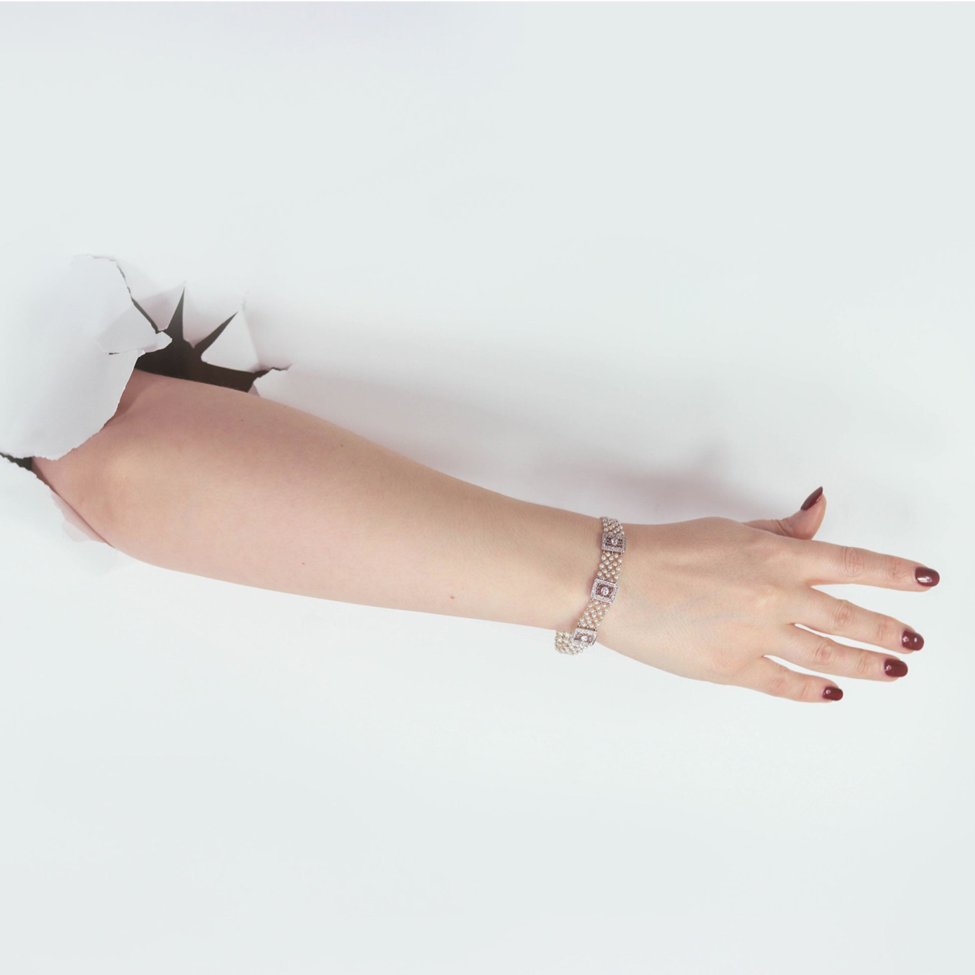 Edwardian Platinum Natural Pearl & Diamond Bracelet on wrist