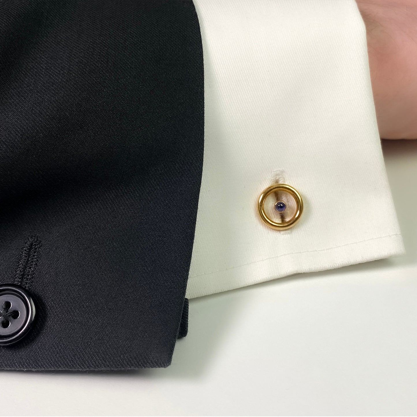 Boucheron French 1970s 18KT Yellow Gold Sapphire Cufflinks on cuff