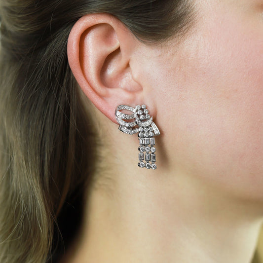 English 1950s Platinum Diamond Earrings on ear