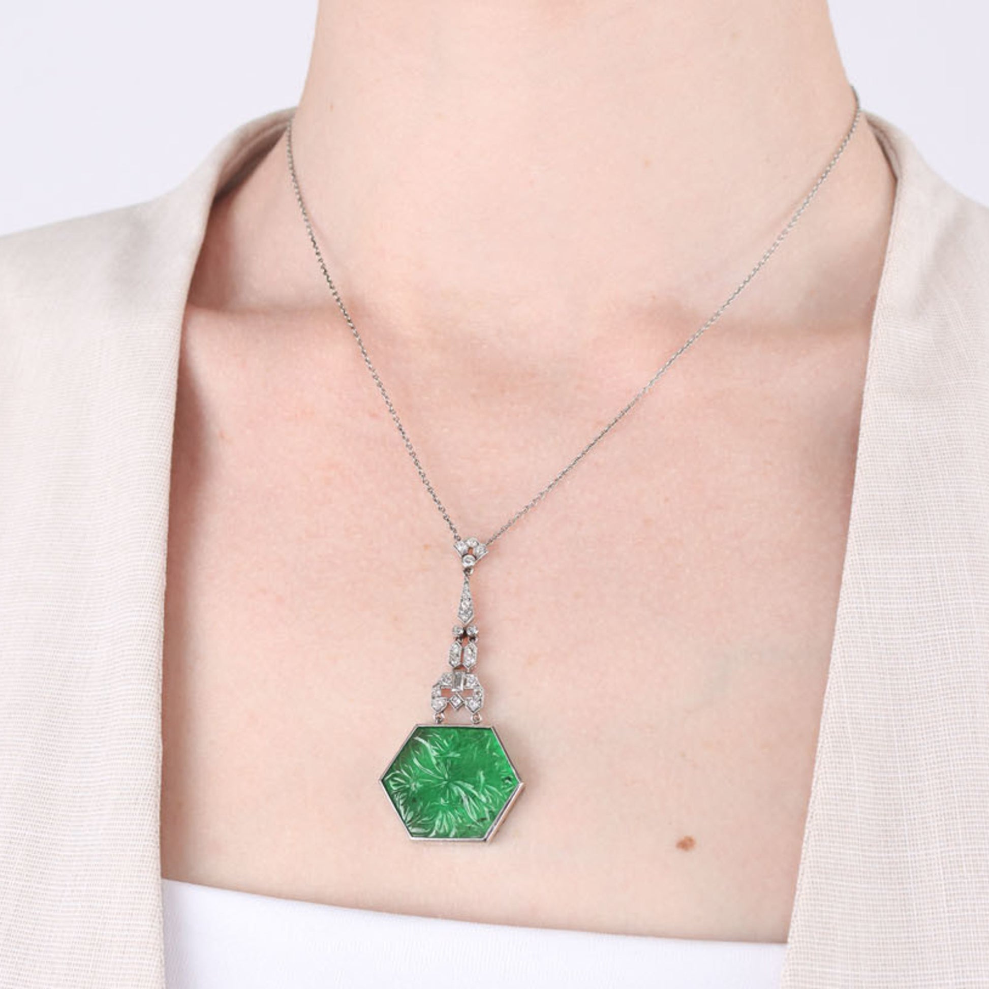 Art Deco Platinum Emerald & Diamond Necklace on neck