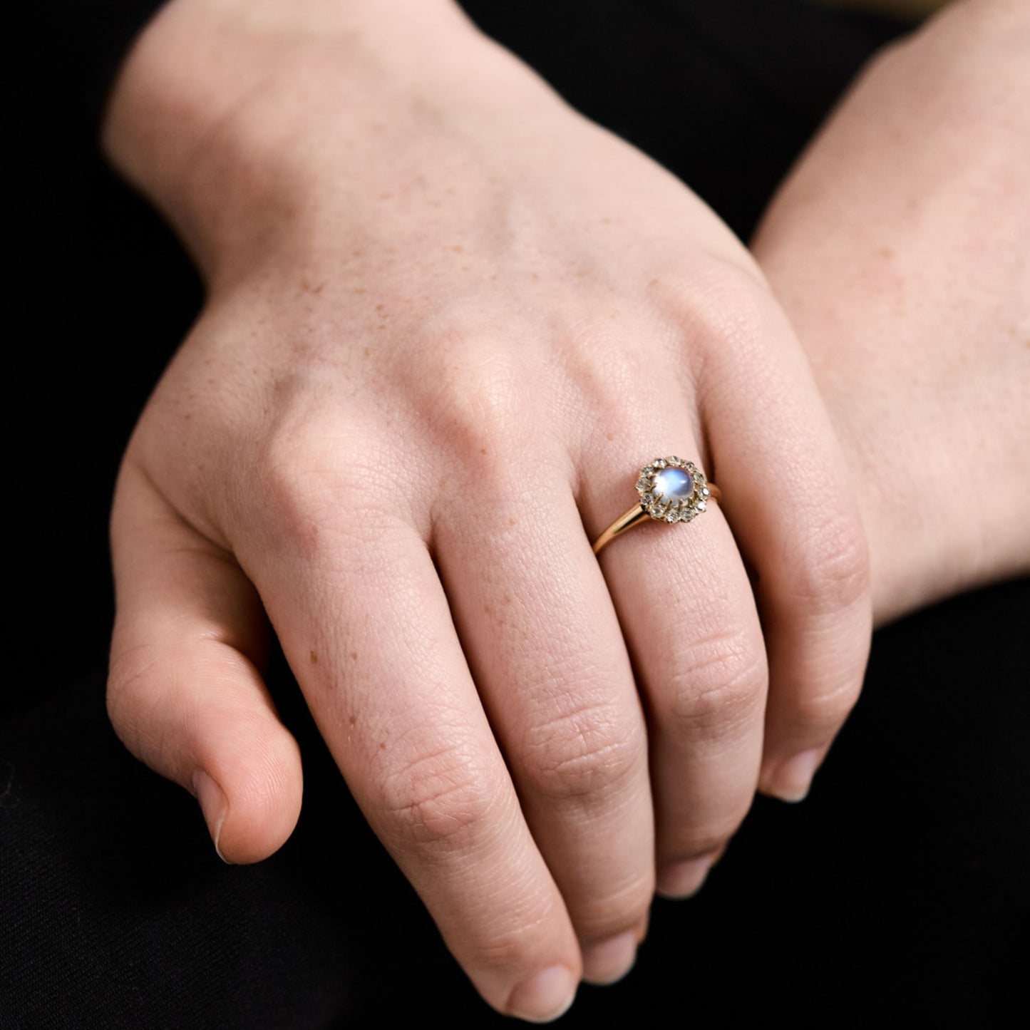 Victorian 18KT Yellow Gold Moonstone & Diamond Ring on finger