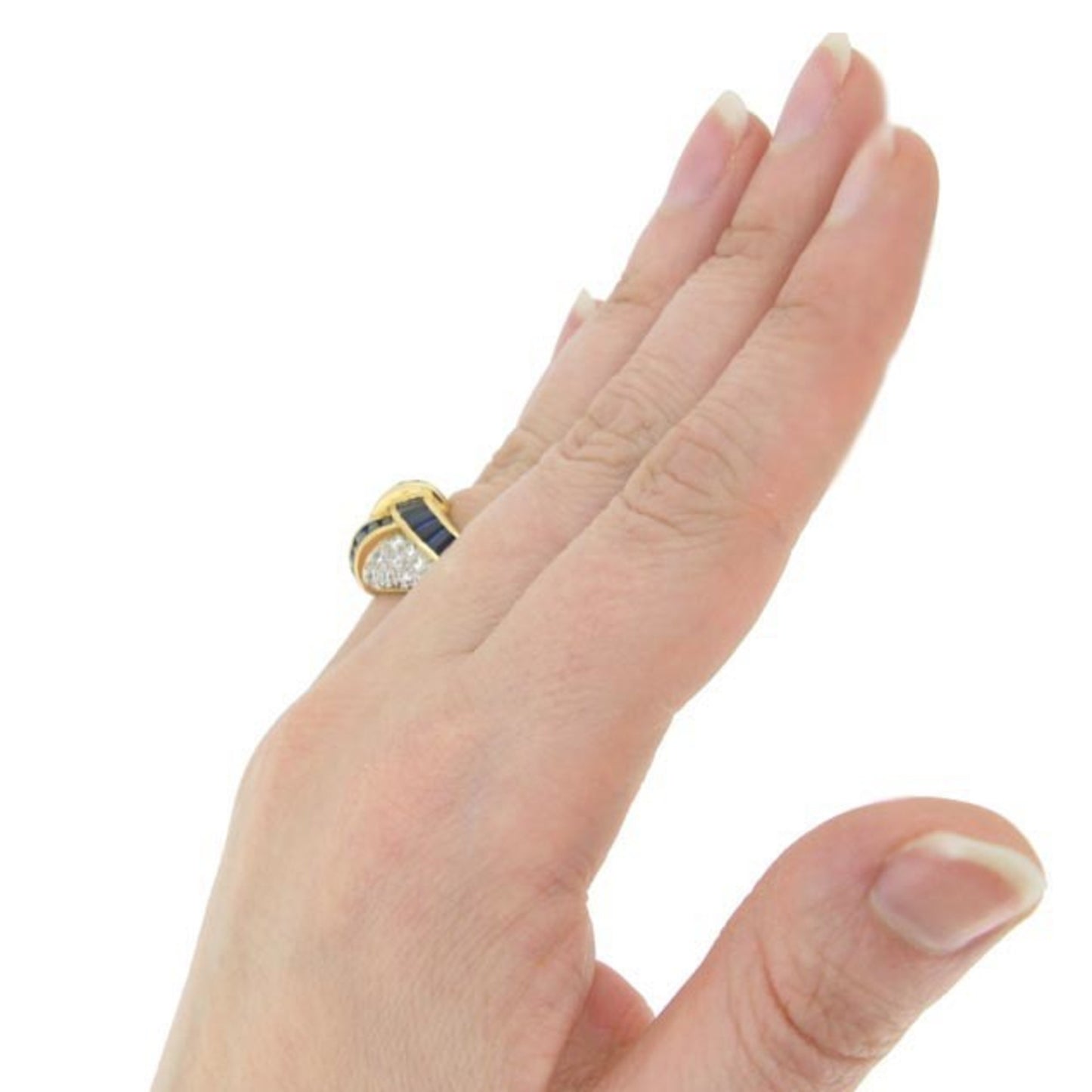 Oscar Heyman Bros. American 1970s Platinum & 18KT Yellow Gold Sapphire & Diamond Ring on finger