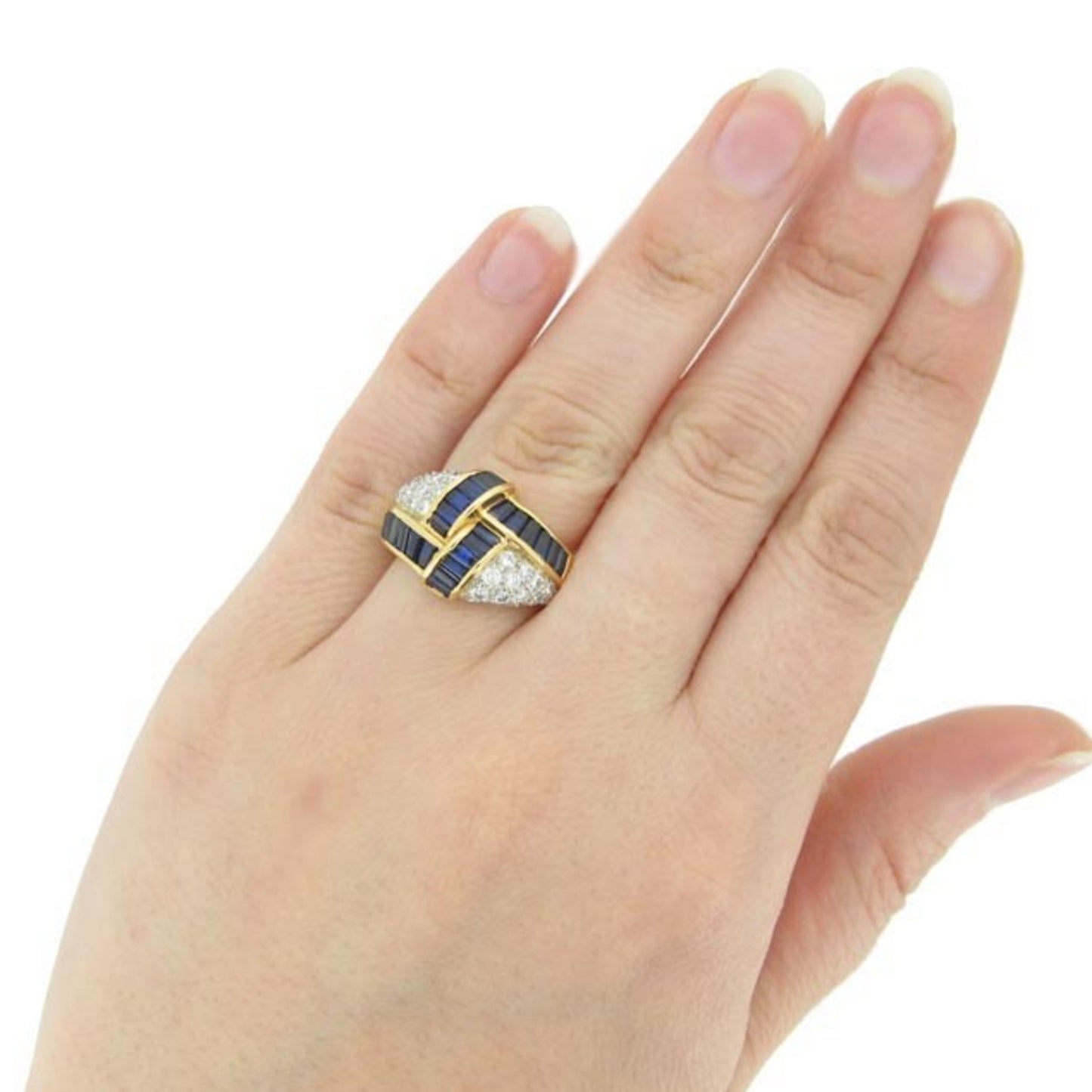 Oscar Heyman Bros. American 1970s Platinum & 18KT Yellow Gold Sapphire & Diamond Ring on finger