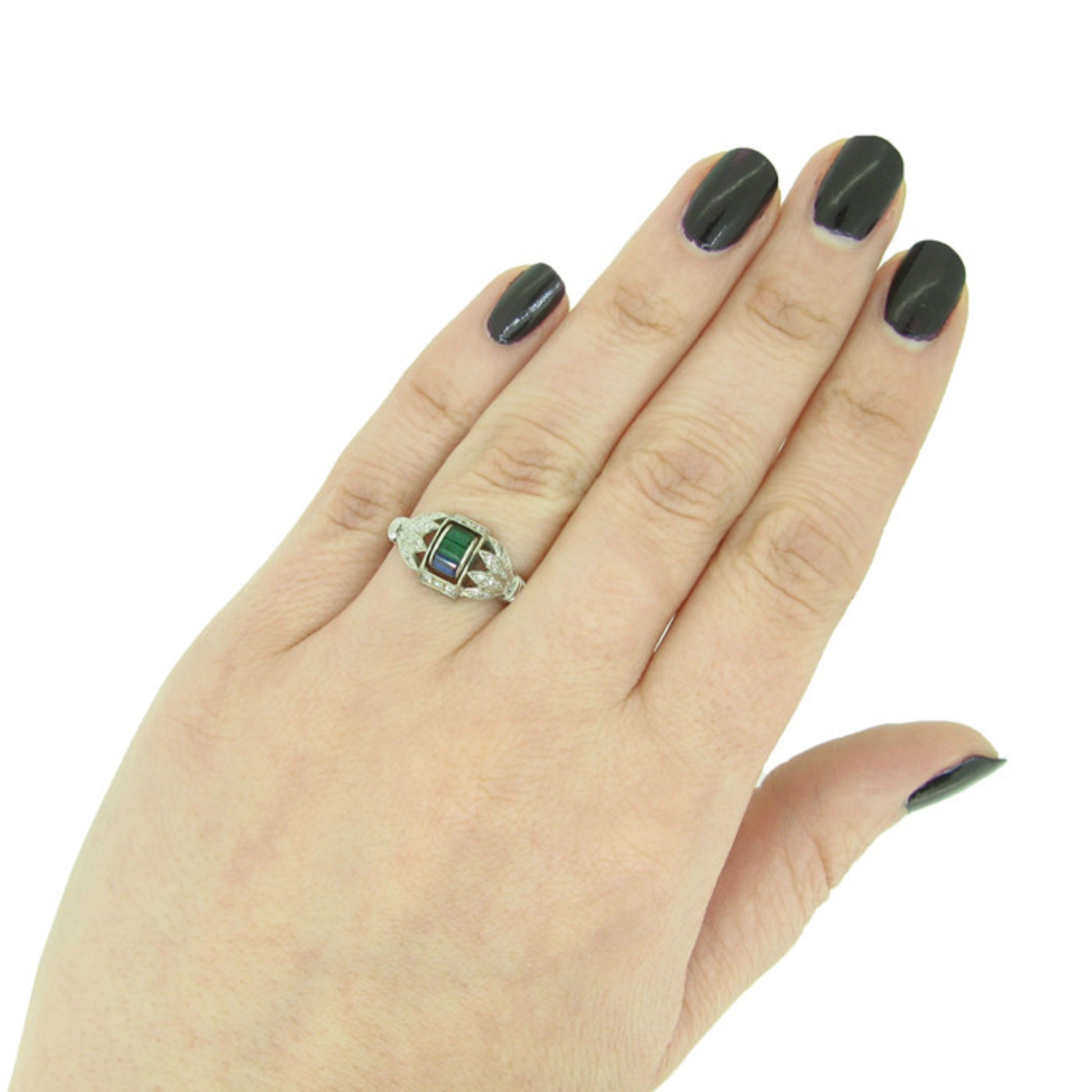 W & H Ltd. Art Deco Platinum Emerald, Diamond & Sapphire Ring on finger