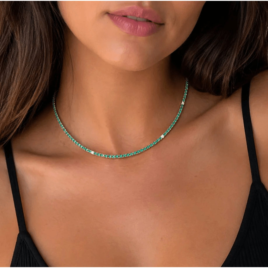 Contemporary 18KT Yellow Gold Emerald & Diamond Necklace on neck