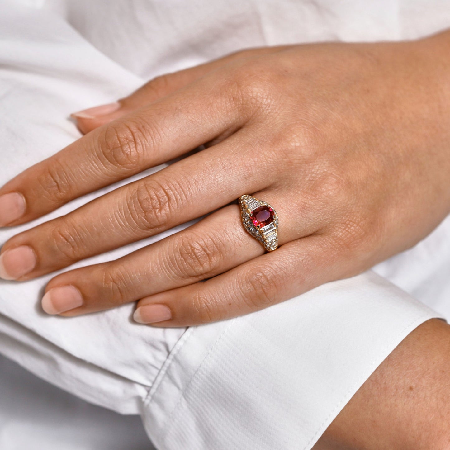 Bulgari Italian 1980s 18KT Yellow Gold Ruby & Diamond Ring on finger