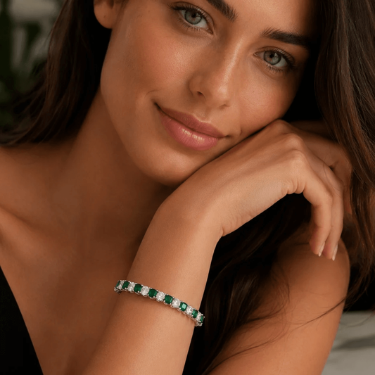 Contemporary Platinum Emerald & Diamond Bracelet on wrist