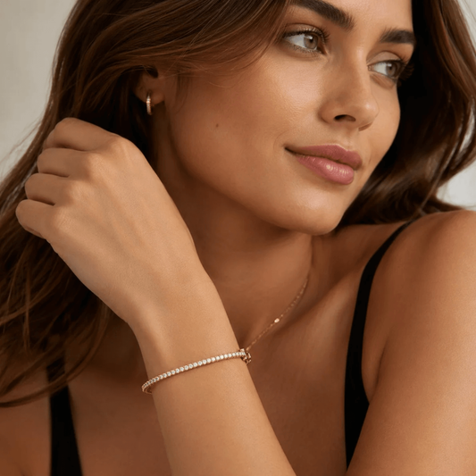 Contemporary 14KT Yellow Gold Diamond Bracelet on wrist