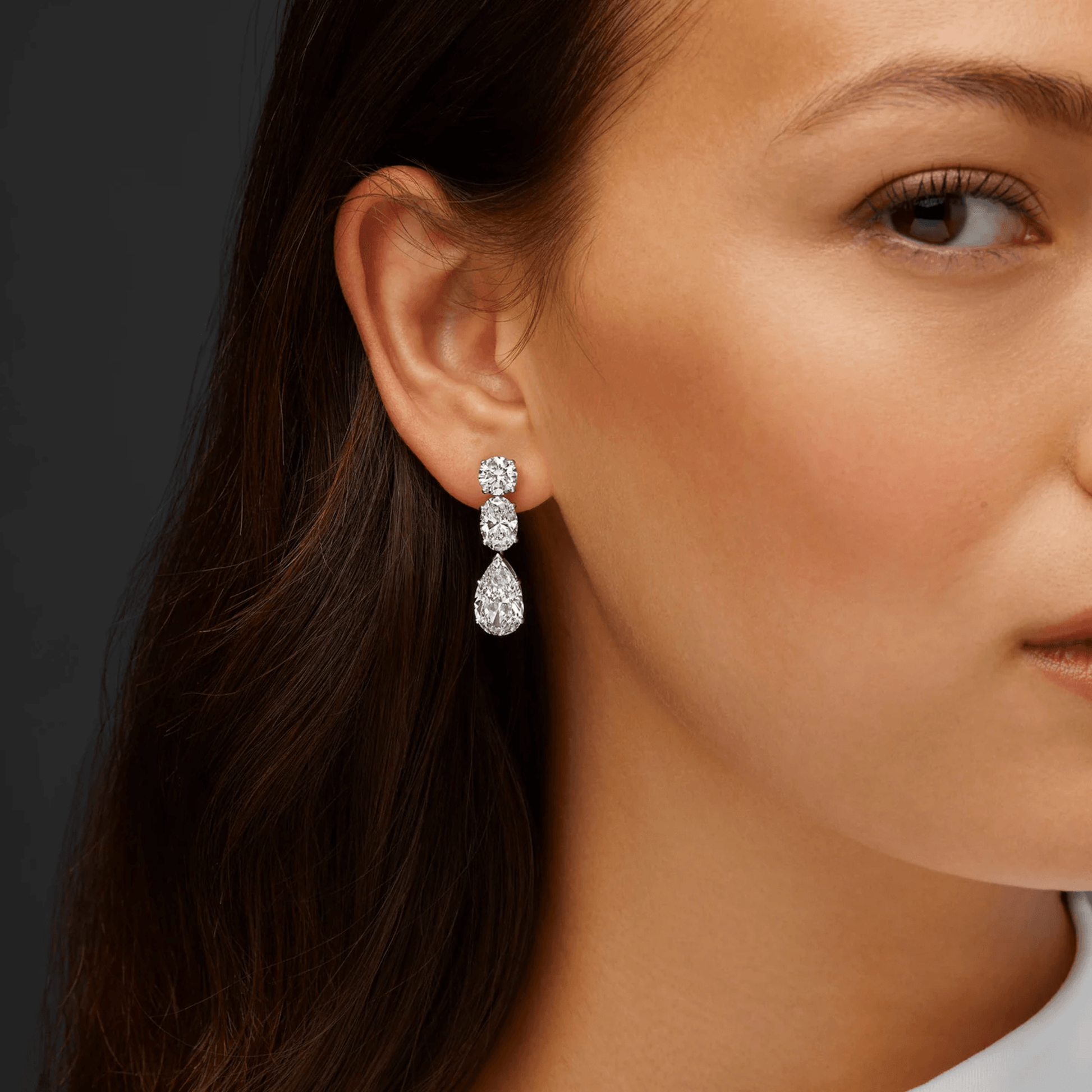 Tiffany & Co. Post-1980s Platinum Diamond Earrings on ear