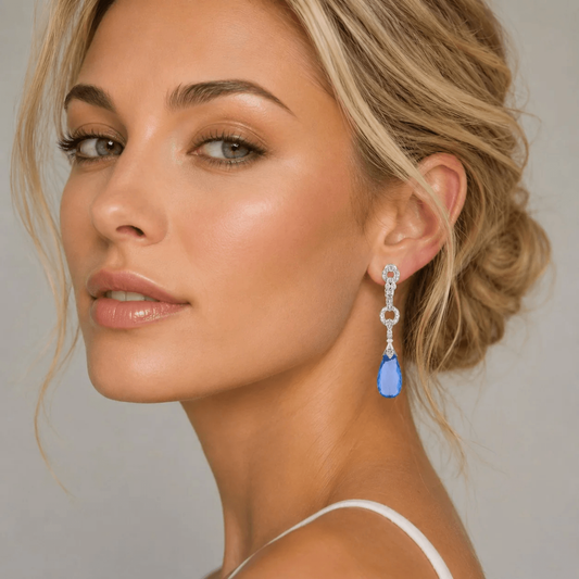Contemporary 14KT White Gold Topaz & Diamond Earrings on ear