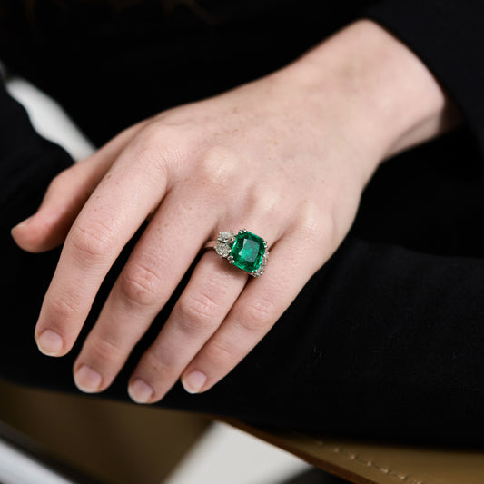 Boucheron French Art Deco Platinum Emerald Ring on finger