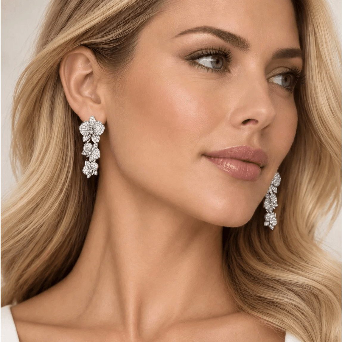Cartier Post-1980s 18KT White Gold Diamond Caresse d'Orchidees Earrings on ear