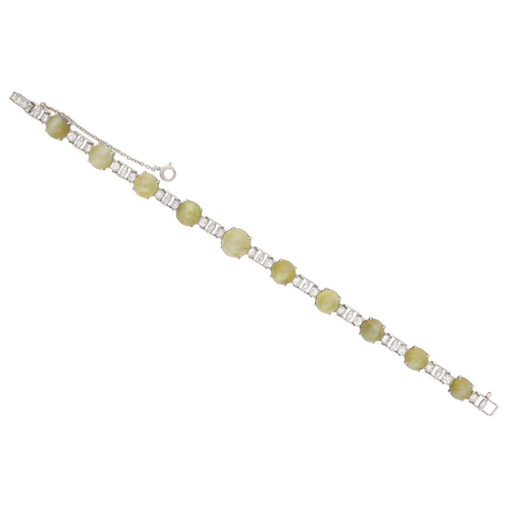 J.E. Caldwell 1930s Platinum Chrysoberyl Cat's Eye & Diamond Bracelet front