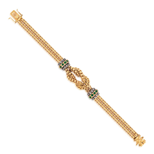 1980s 18KT Yellow Gold Diamond & Emerald Knot Bracelet front