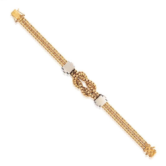 1980s 18KT Yellow Gold Diamond & Emerald Knot Bracelet back