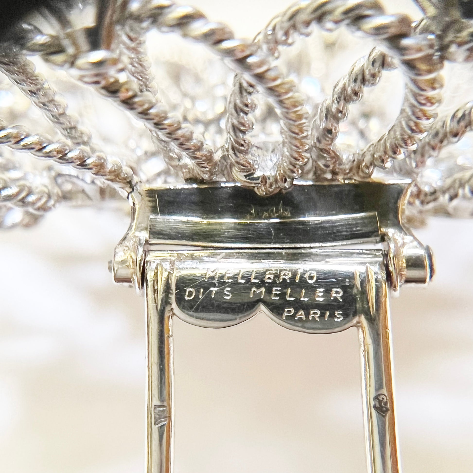 Mellerio French 1940s Platinum & 18KT Yellow Gold Diamond Brooch close-up details and signature