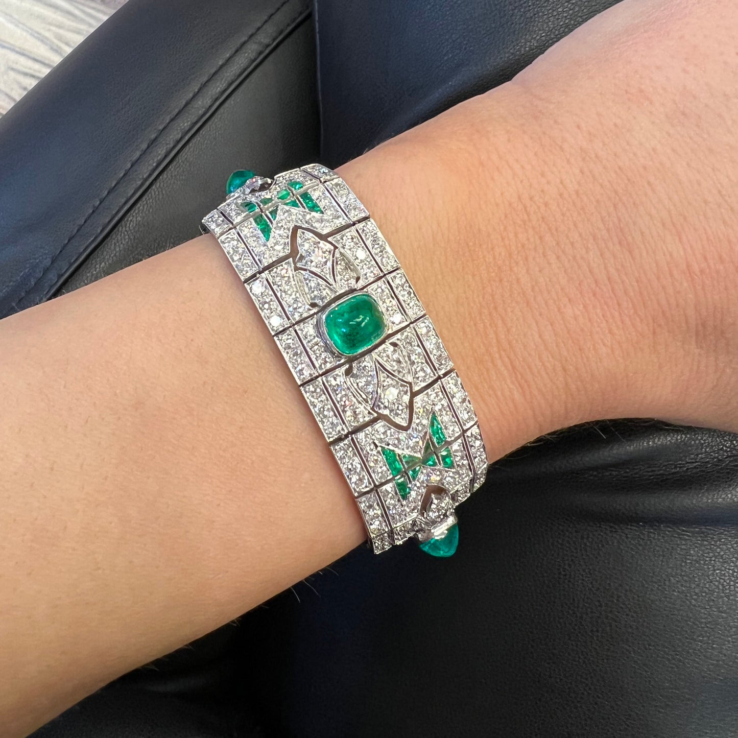Art Deco Platinum Emerald & Diamond Bracelet worn on wrist