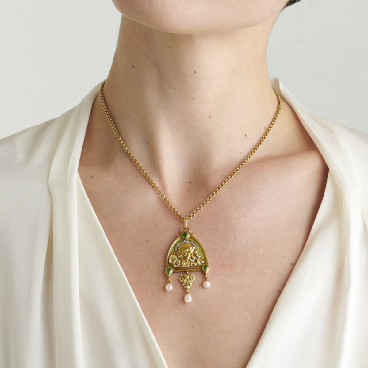 Art Nouveau 18KT Yellow Gold Diamond, Enamel, Natural Pearl & Peridot Necklace worn on neck