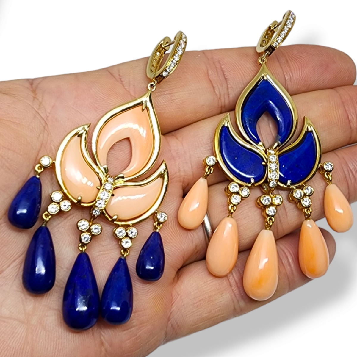 1970s 18KT Yellow Gold Diamond, Coral & Lapis Lazuli Floral Earrings in hand
