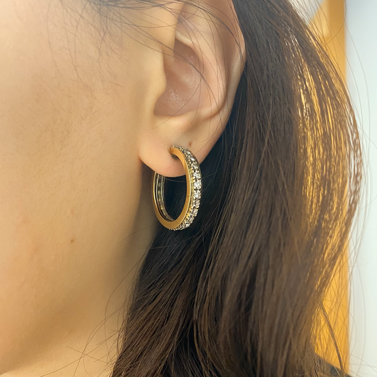 1970s 14KT Yellow Gold Diamond Hoop Earrings worn on ear