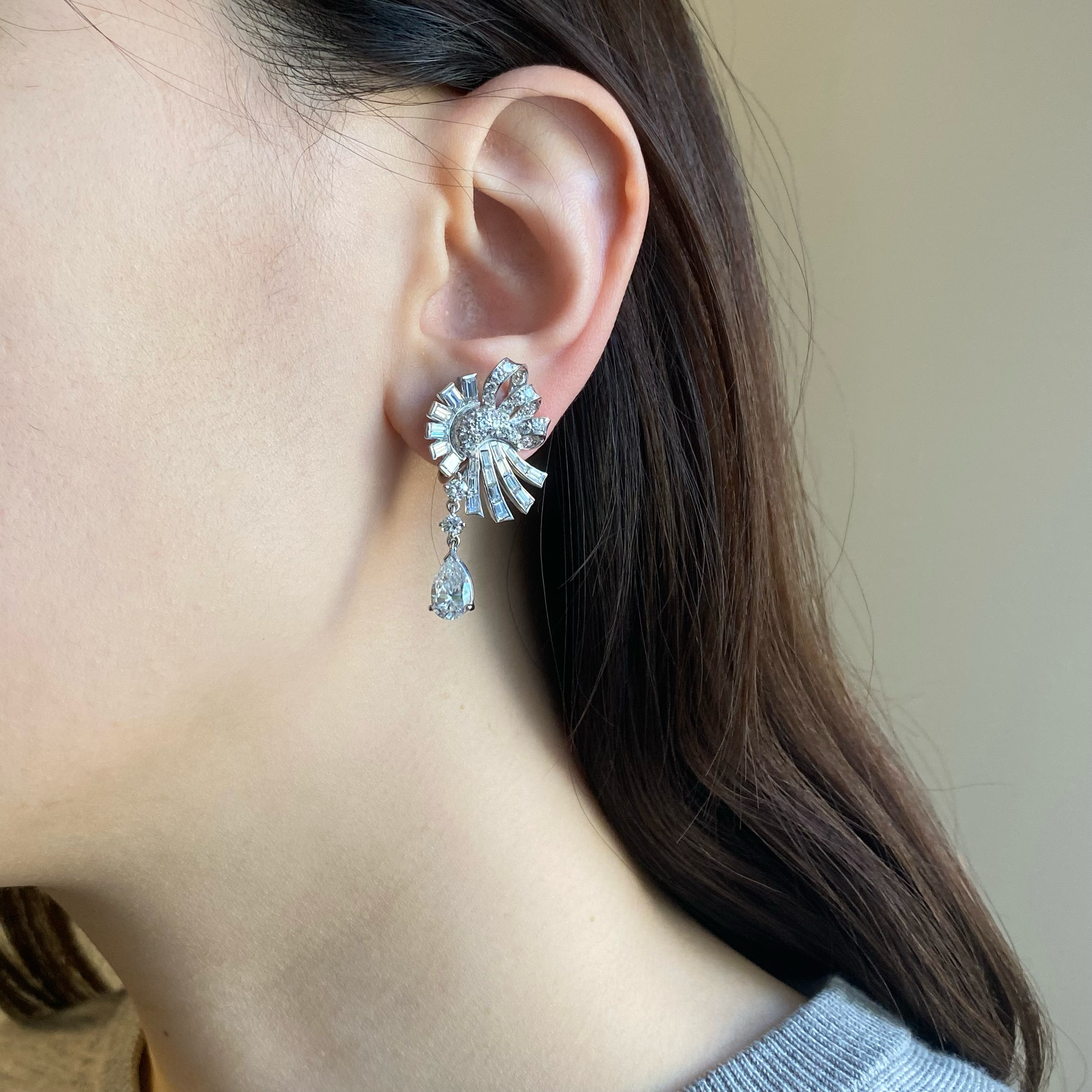 1950s Platinum Diamond Earrings worn on ear