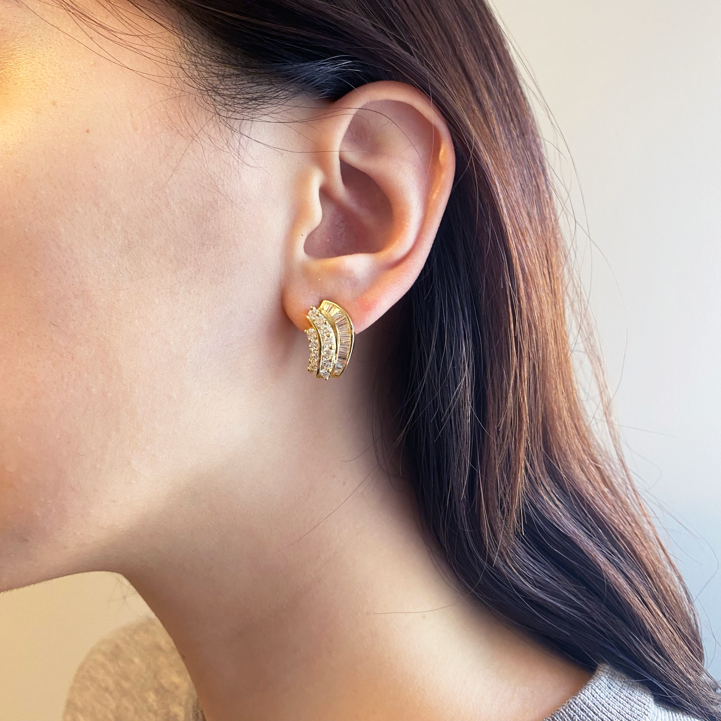 1980s 18KT Yellow Gold Diamond Earrings worn on ear