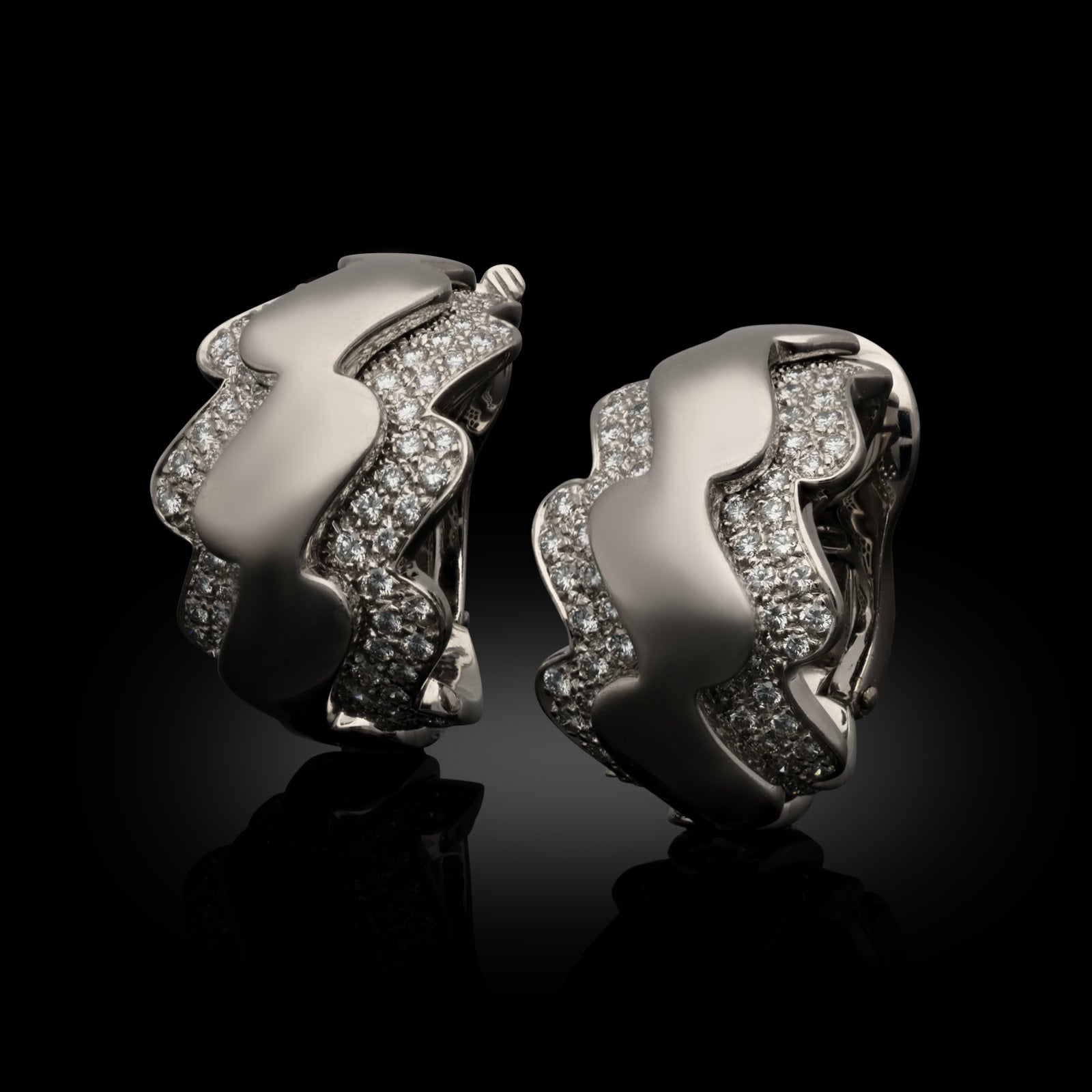 French Van Cleef & Arpels Post-1980s 18KT White Gold Diamond Wave Hoop Earrings front side view