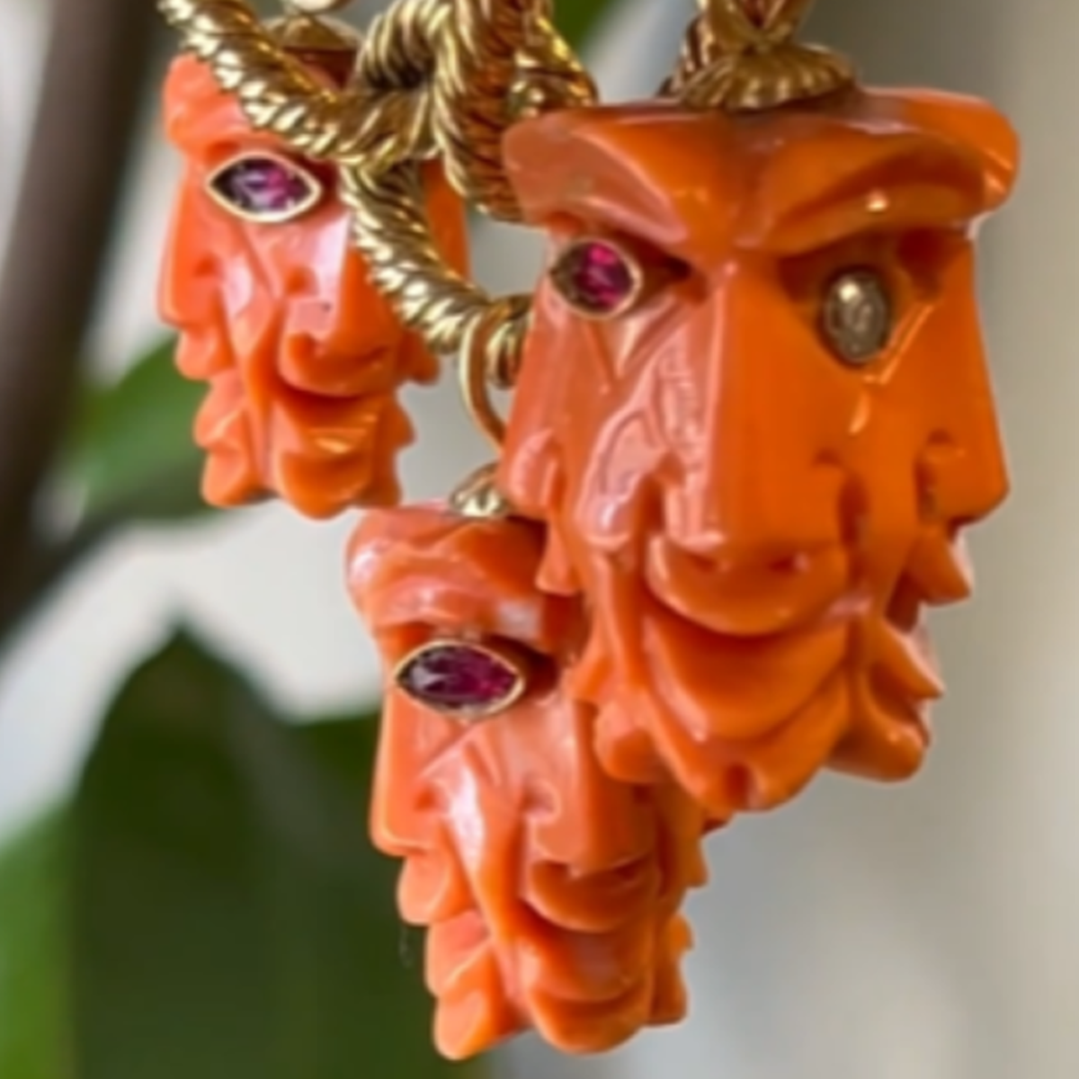 1970s 18KT Yellow Gold Carved Coral, Diamond & Ruby Charm Bracelet close-up details