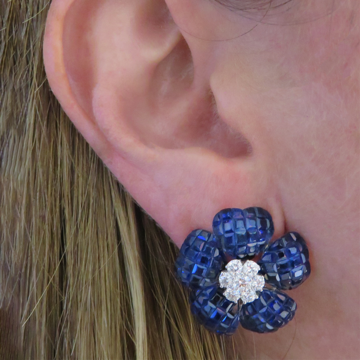 Post-1980s 18KT White Gold Blue Sapphire & Diamond Flower Earrings worn on ear