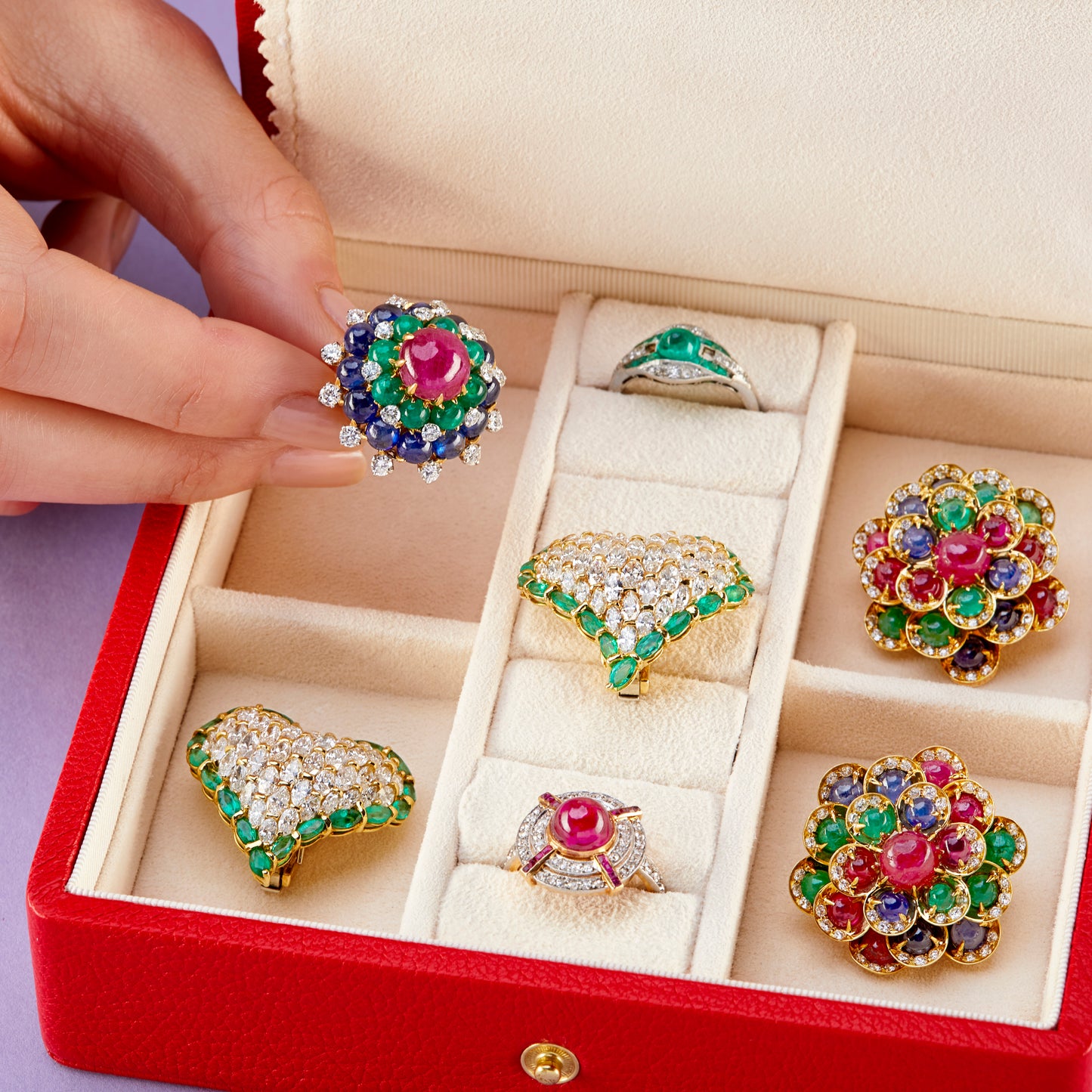 Bulgari 1960s 18KT Yellow Gold Ruby, Diamond, Emerald & Sapphire Ring front view in jewelry box