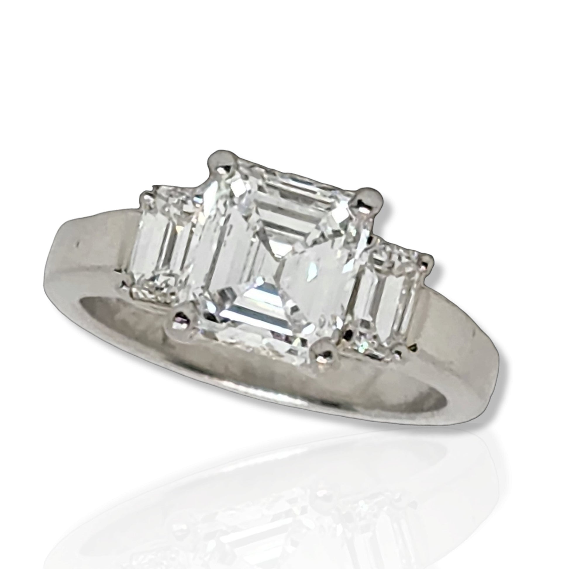 1980s Platinum Diamond Three-Stone Ring front view