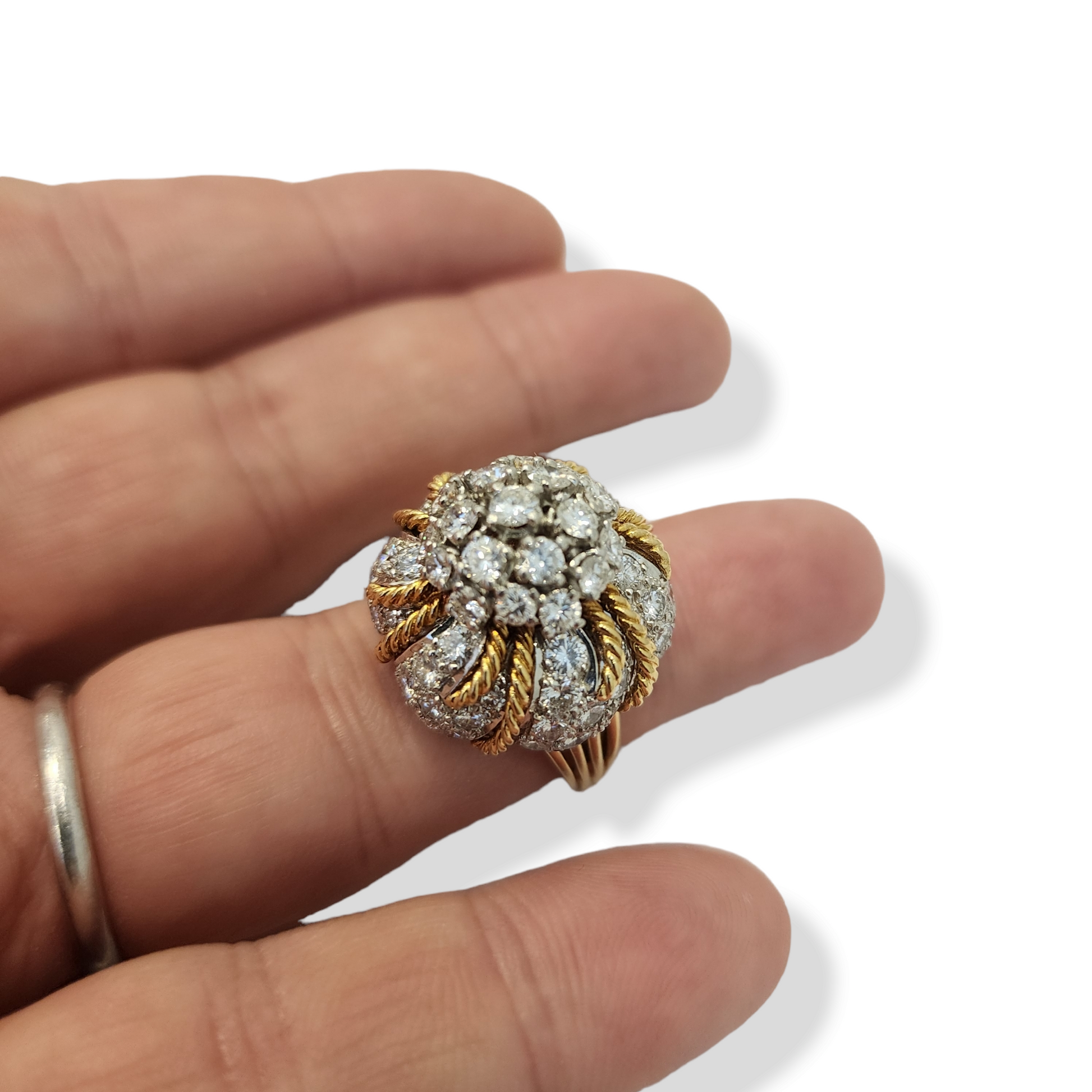 1960s 18KT Yellow Gold Diamond Domed Ring on finger