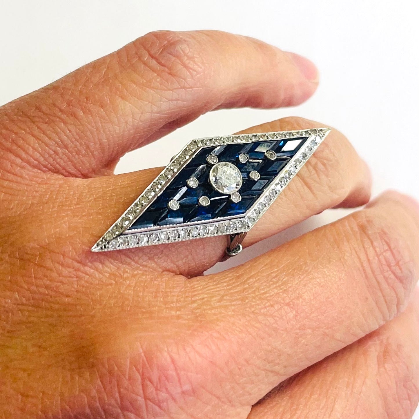 French Edwardian Platinum Sapphire & Diamond Lozenge Ring worn on hand