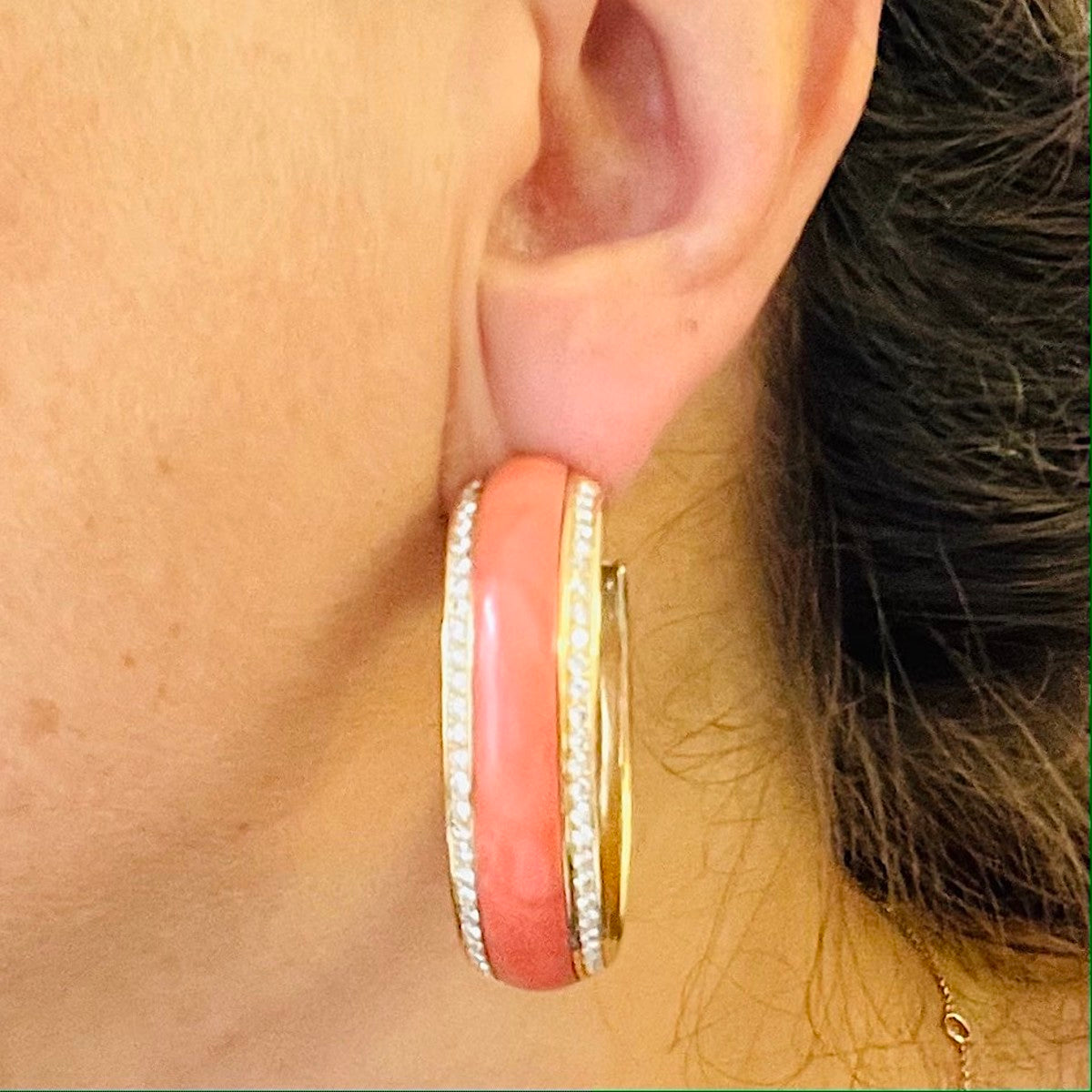 Piaget French 1980s 18KT Yellow Gold Coral & Diamond Creoles Earrings on ear