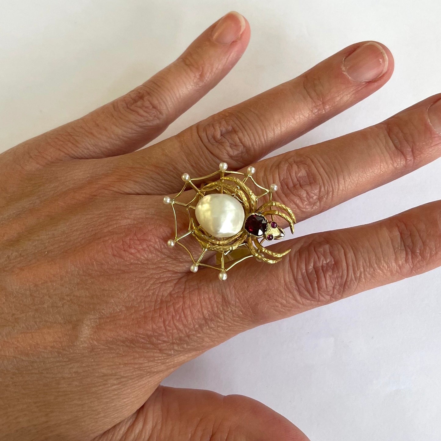 Post-1980s 18KT Yellow Gold Natural Pearl & Garnet Spider Ring on finger