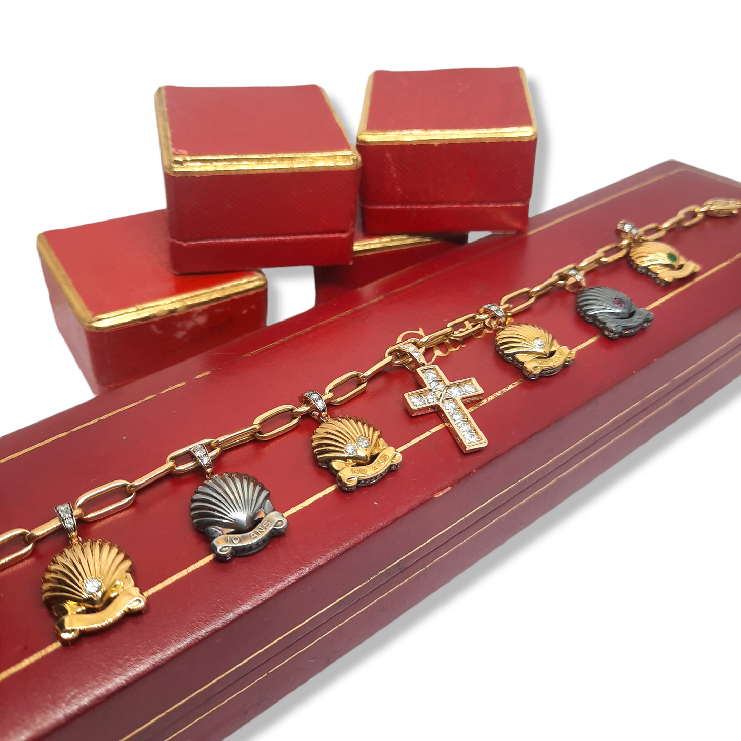Cartier French 1980s 18KT Yellow Gold & Silver Diamond Charm Bracelet on jewelry box
