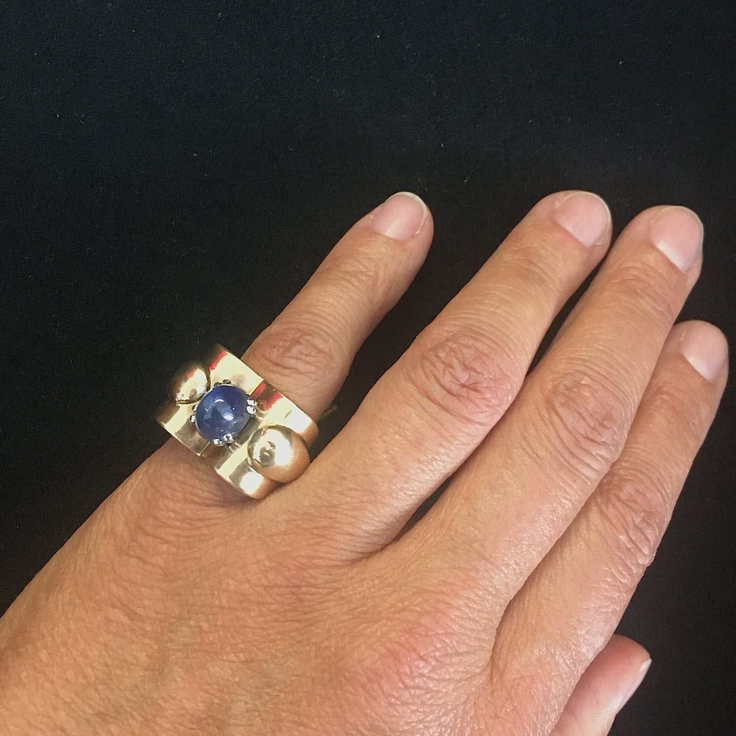 1950s 18KT Yellow Gold Sapphire Ring on finger