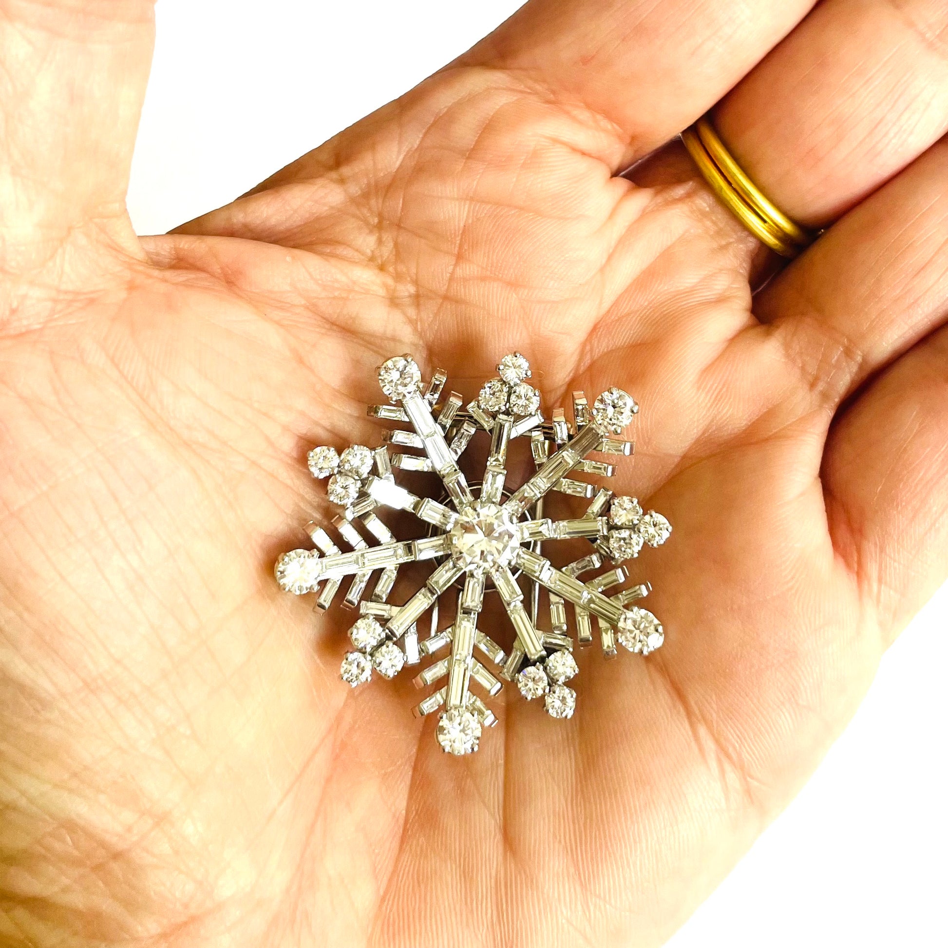 French 1960s Platinum Diamond Snowflake Brooch in hand