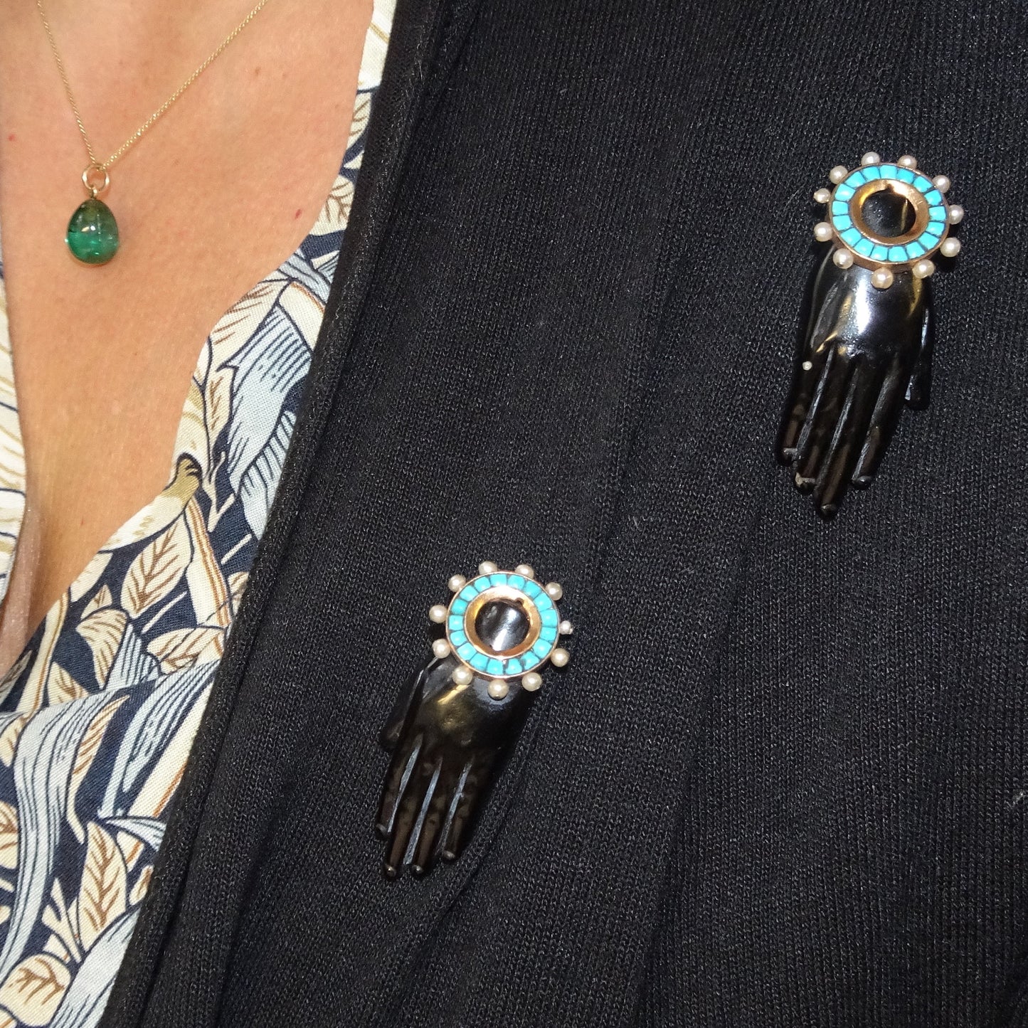 Rene Boivin French 1930s 18KT Yellow Gold Black Coral, Natural Pearl & Turquoise Hand Brooches worn on blouse
