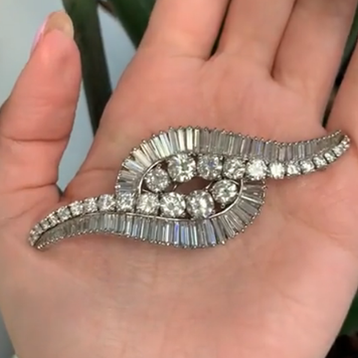 Boucheron Paris 1950s Platinum Diamond Double Clips Brooch in hand