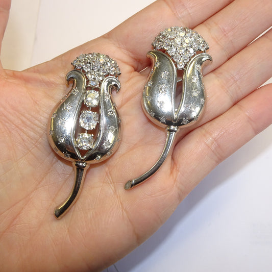 Rene Boivin French 1930s Platinum Diamond Tulip Brooches in hand