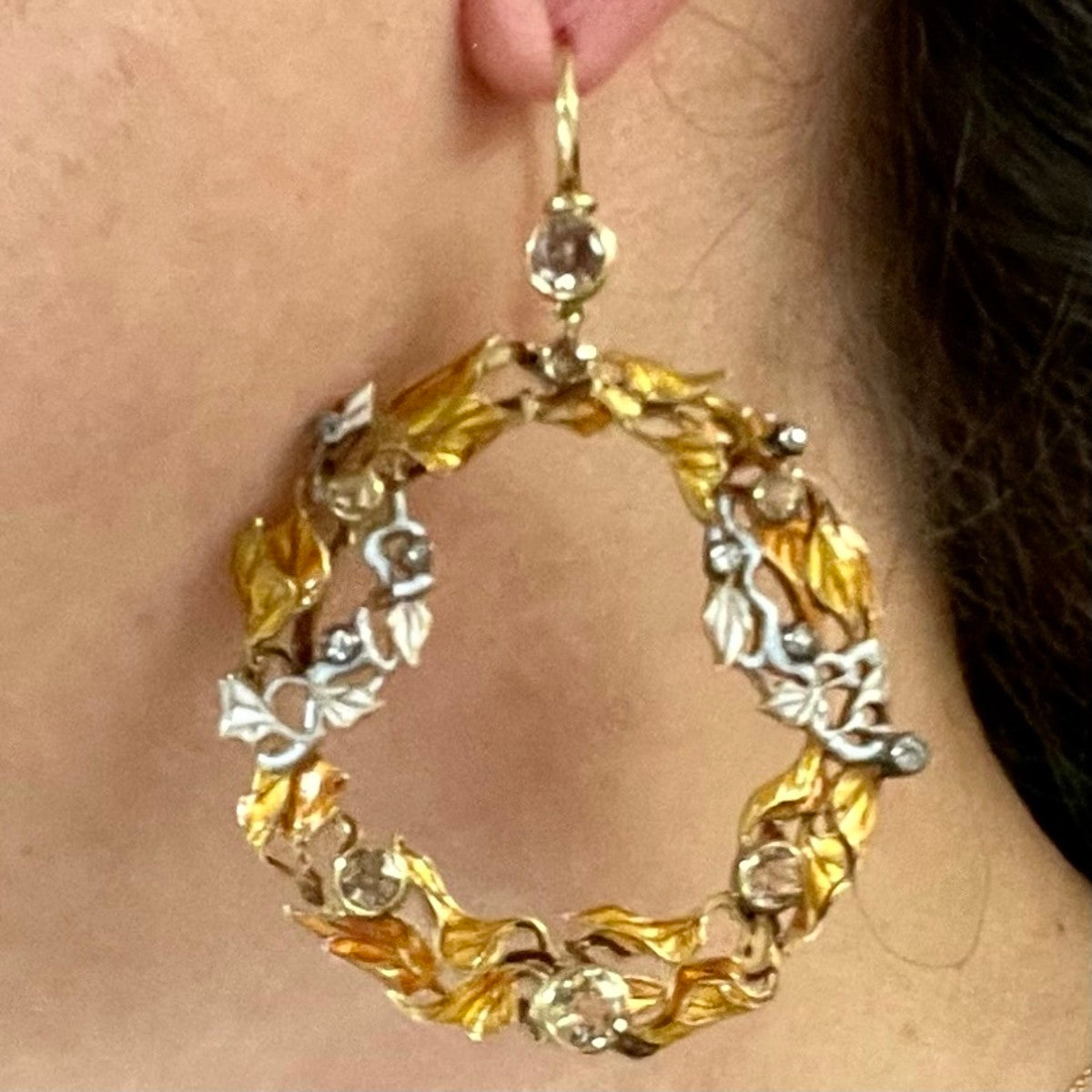 Art Nouveau 18KT Yellow Gold Diamond & Enamel Earrings worn on ear
