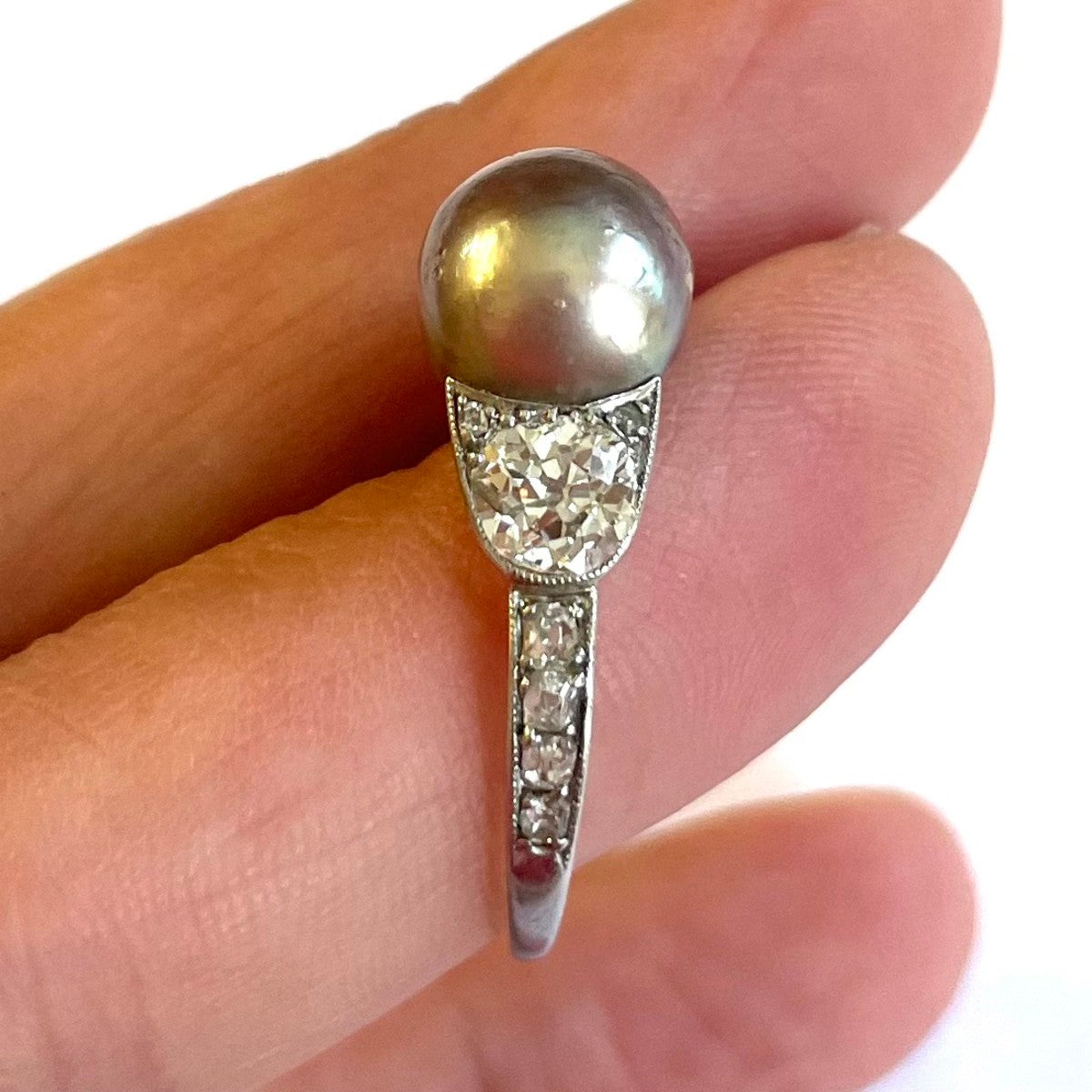 Edwardian Platinum Natural Pearl & Diamond Ring in hand