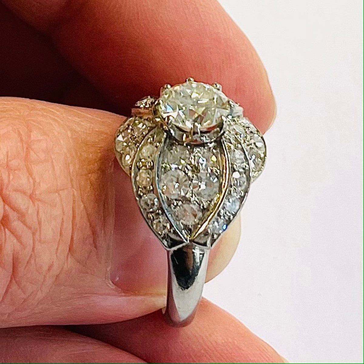 Edwardian Platinum Diamond Ring in hand