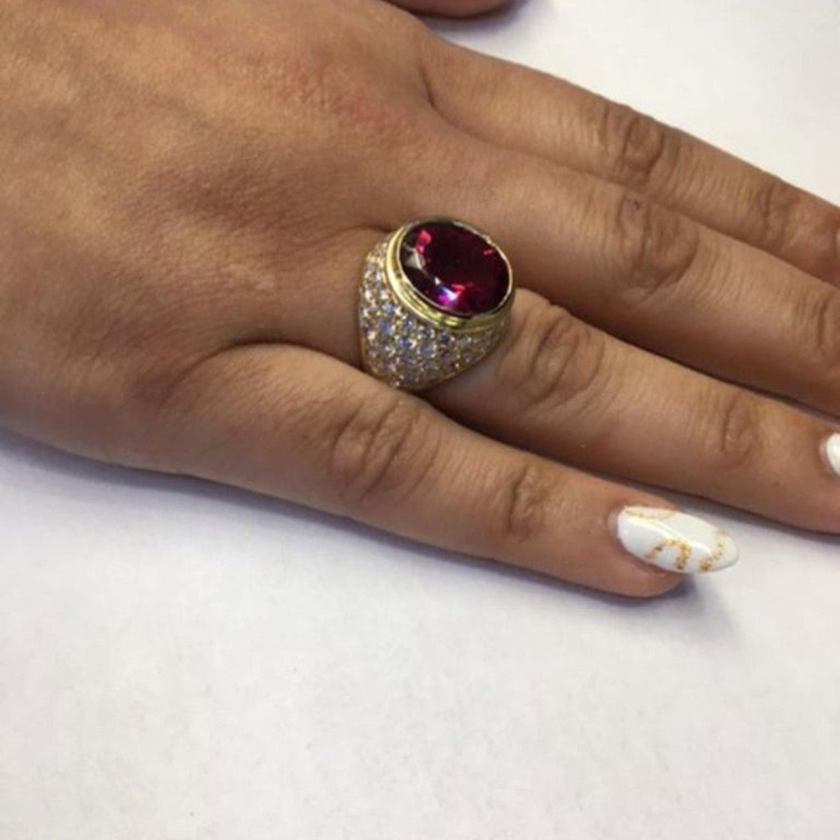 1980s 18KT Yellow Gold Rubellite Tourmaline & Diamond Ring worn on finger
