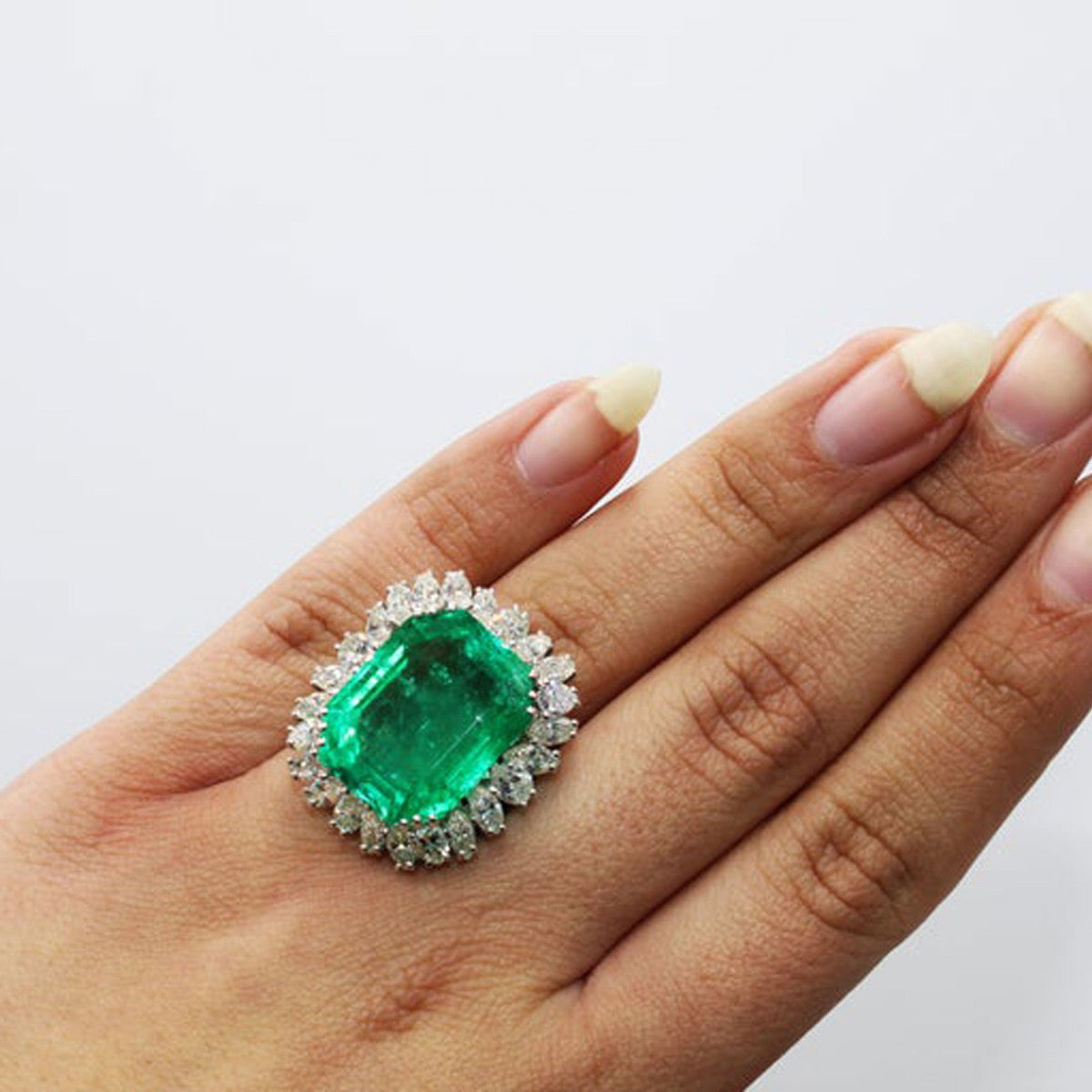 1970s 18KT White Gold Emerald & Diamond Ring on finger