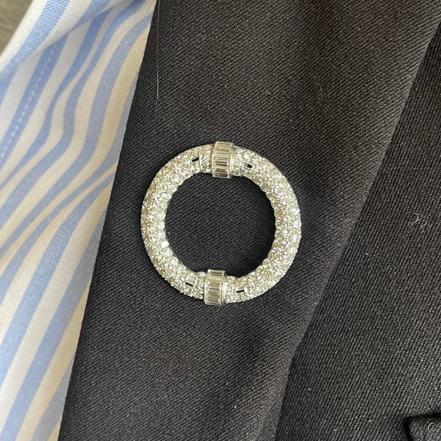 Art Deco Platinum Diamond Circle Brooch worn on lapel
