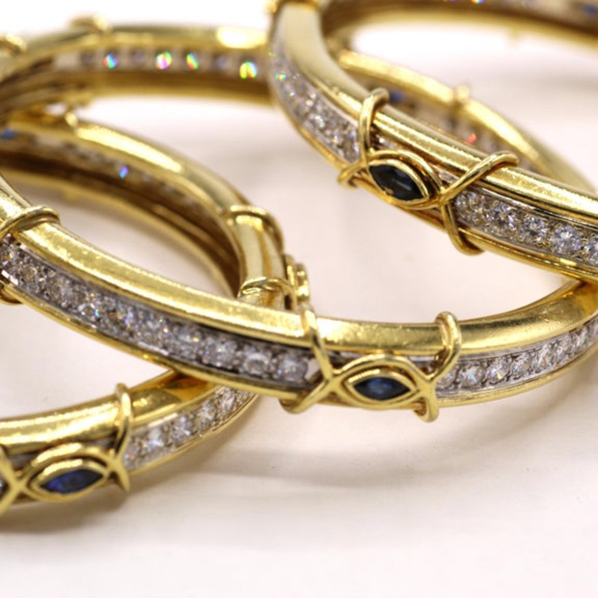 Boris Lebeau 1980s 18KT Yellow Gold Diamond & Sapphire Bangle Bracelets close-up details